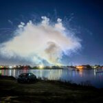A cloud of fireworks smoke from one of 150 SeaWorld fireworks shows per year that pollute Mission Bay.